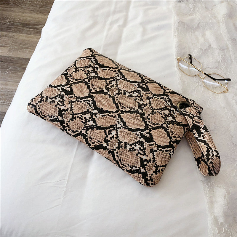 Snake print clutch